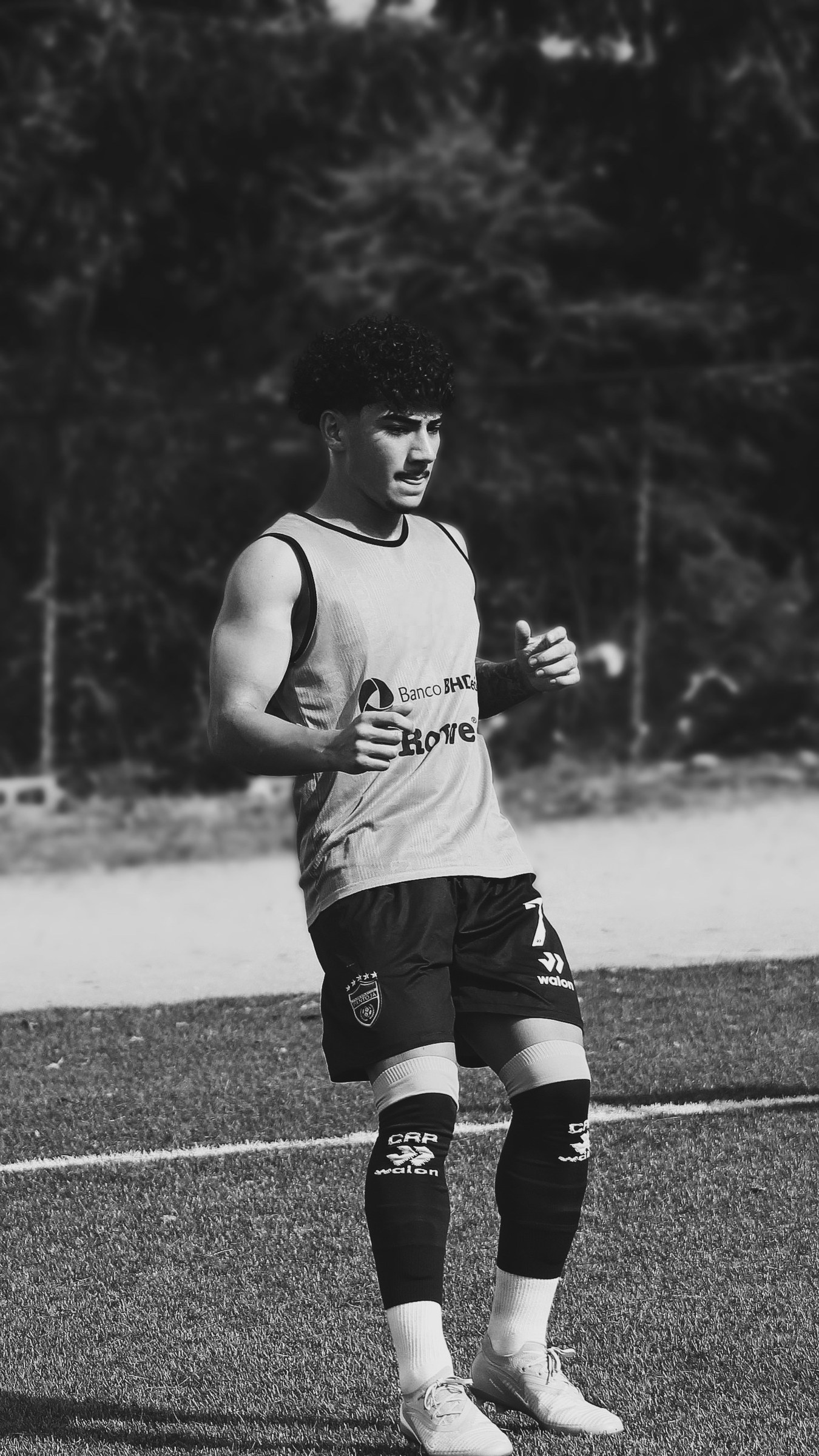 Nathanael Vasiliadis in black and white training portrait